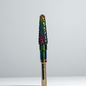Multicolored nail drill bit on a white background